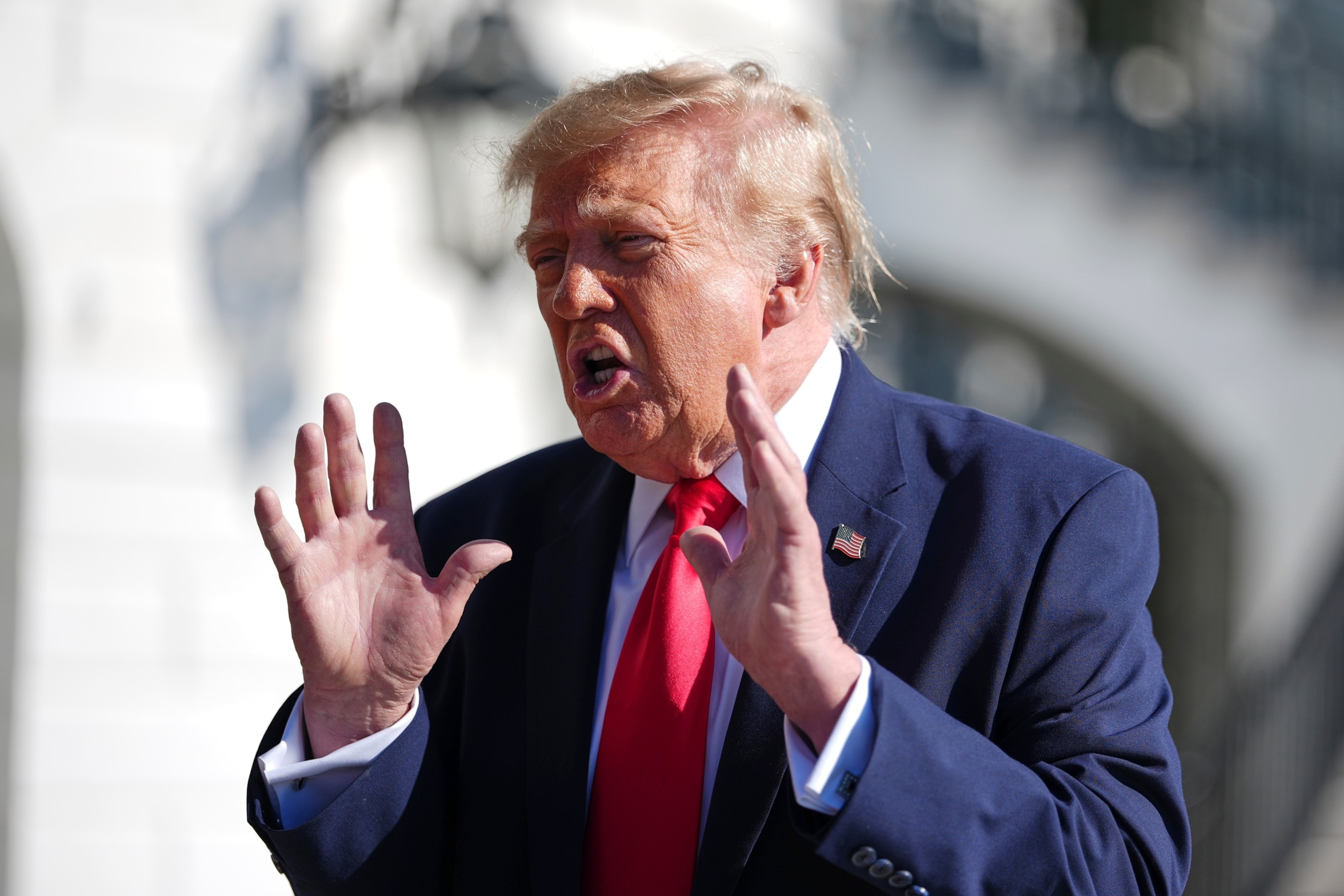 President Donald Trump speaks with reporters before boarding Marine One on the South Lawn of the White House, Oct. 23, 2026, in Washington.Julia Demaree Nikhinson/AP Photo