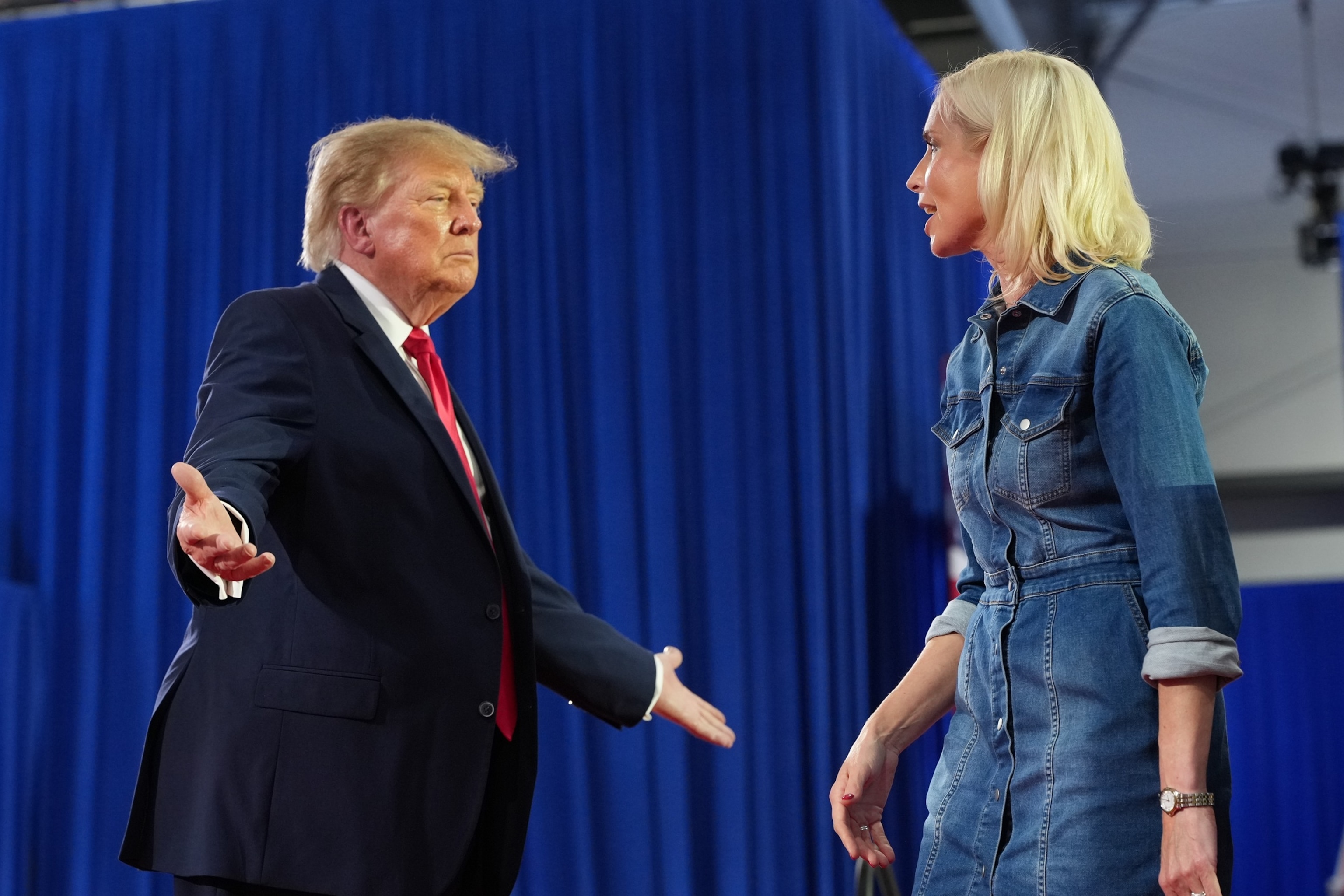 President Donald Trump greets Iowa U.S. Senate candidate Rep. Ashley Hinson at a campaign rally at Sioux Gateway Airport, Oct. 22, 2026, in Sioux City, Iowa.Alex Brandon/AP Photo