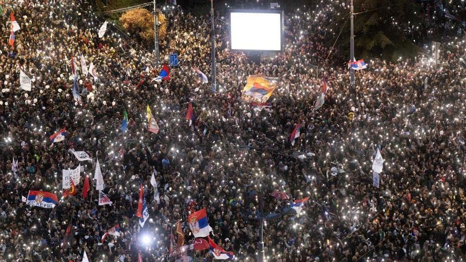 Image caption,A reported 150,000 supporters turned out for the final Student List rally in Belgrade's Slavija Square on Thursday night