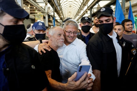 Netanyahu campaign posters are put on display in Jerusalem. The prime minister is pitching the election as a choice between himself and the Arabs.Photograph: Kevin Coombs/Reuters