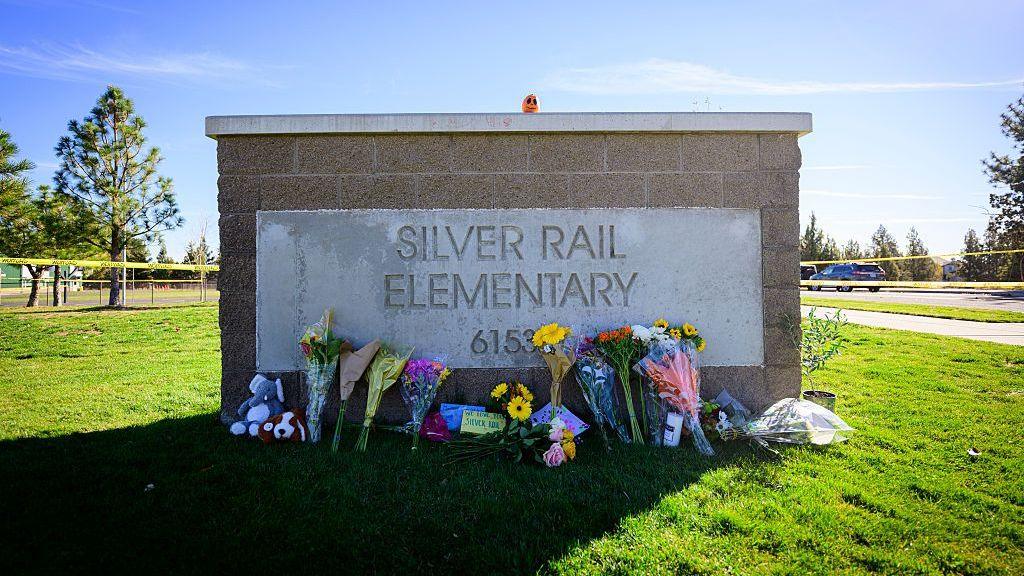 Image caption,Three schoolchildren and a teacher were killed in the shooting