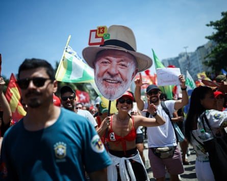 Some Lula supporters believe he can overturn the lead his rival secured in the first round of voting.Photograph: Agustín Marcarian/Reuters