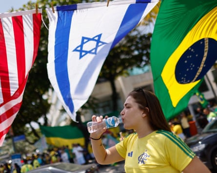 Bolsonaro supporters, some with the flags of the US, Israel and Brazil, also held last-minute rallies on Saturday.Photograph: Raquel Cunha/Reuters