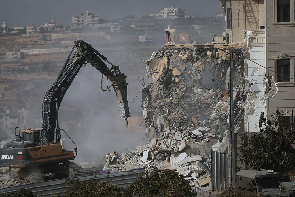 Image caption,Bulldozers began demolitions on Friday afternoon