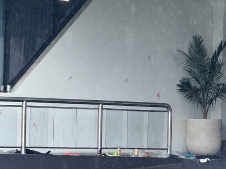 Bullet holes visible in the wall at Fitzy’s Loganholme.Photograph: Ben Smee/The Guardian