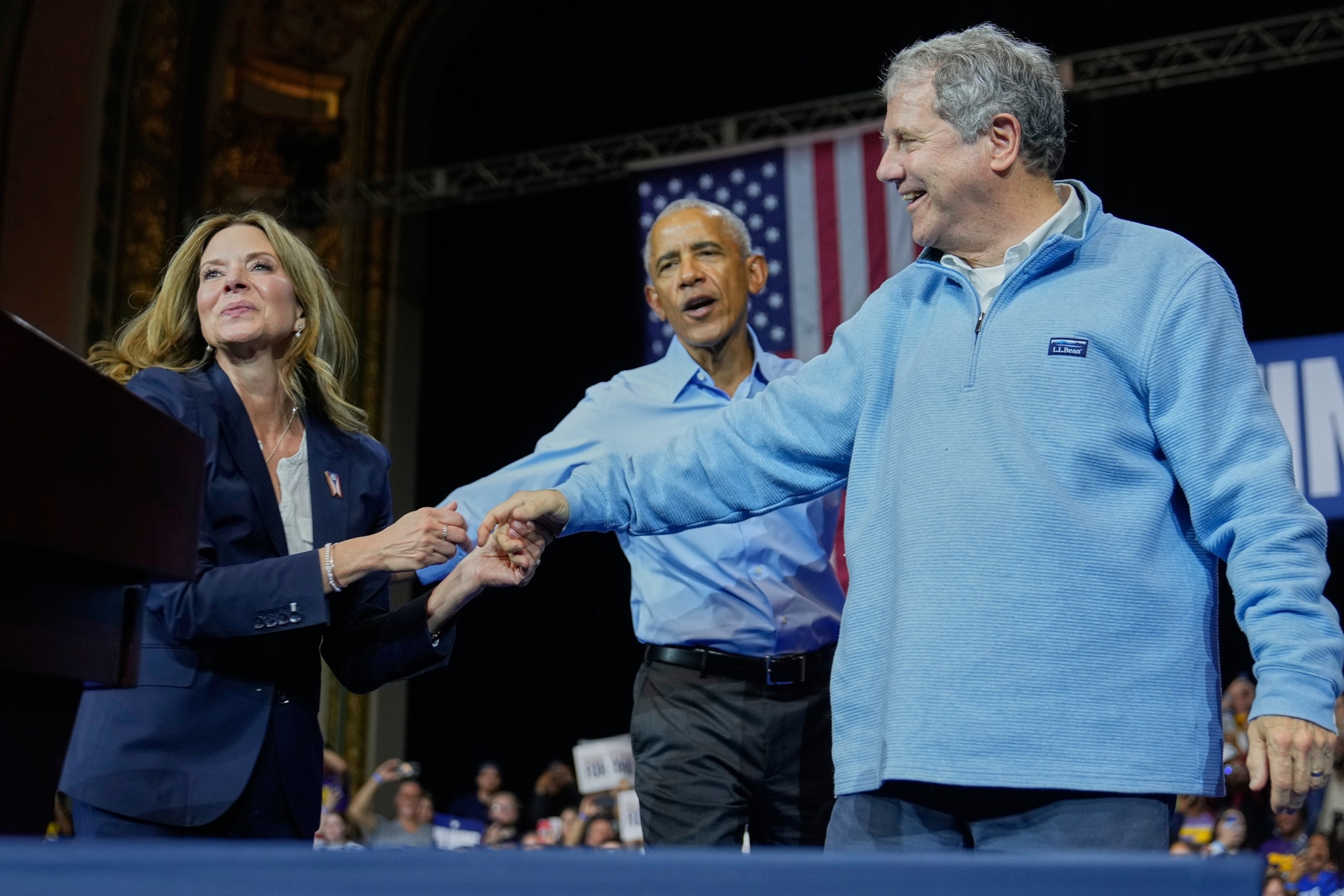 From left, Democratic Ohio gubernatorial candidate Amy Acton, left, former President Barack Obama, center, and Ohio Democratic candidate for U.S. Senate Sherrod Brown, right, attend a campaign rally Saturday, Oct. 24, 2026, in Cleveland.Sue Ogrocki/AP Photo