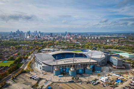 An aerial view of the Etihad Stadium, the home of Manchester City, with the Ancoats and New Islington neighbourhoods in the background.Photograph: Dominic Lipinski/Bloomberg/Getty Images