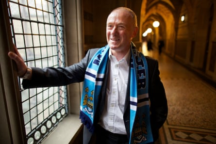 Richard Leese wearing a City scarf in Manchester town hall in May 2010 when he was the leader of the city council.Photograph: Christopher Thomond/The Guardian