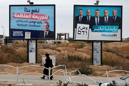 Candidates in the upcoming Israeli election include Yair Golan of the Democrats party (left billboard) and the Arab-led Joint List.Photograph: Amir Cohen/Reuters