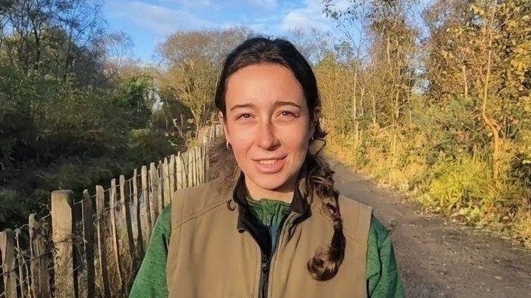 Image caption,Chloe McElhatton is part of the bear team at Wild Ireland and says looking after bears is not your average 9-5 job