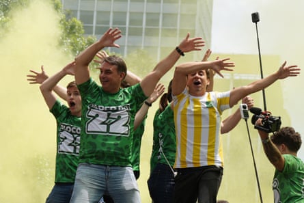 Flávio Bolsonaro dancing at a rally in São Paulo on 18 October.Photograph: Alexandre Meneghini/Reuters