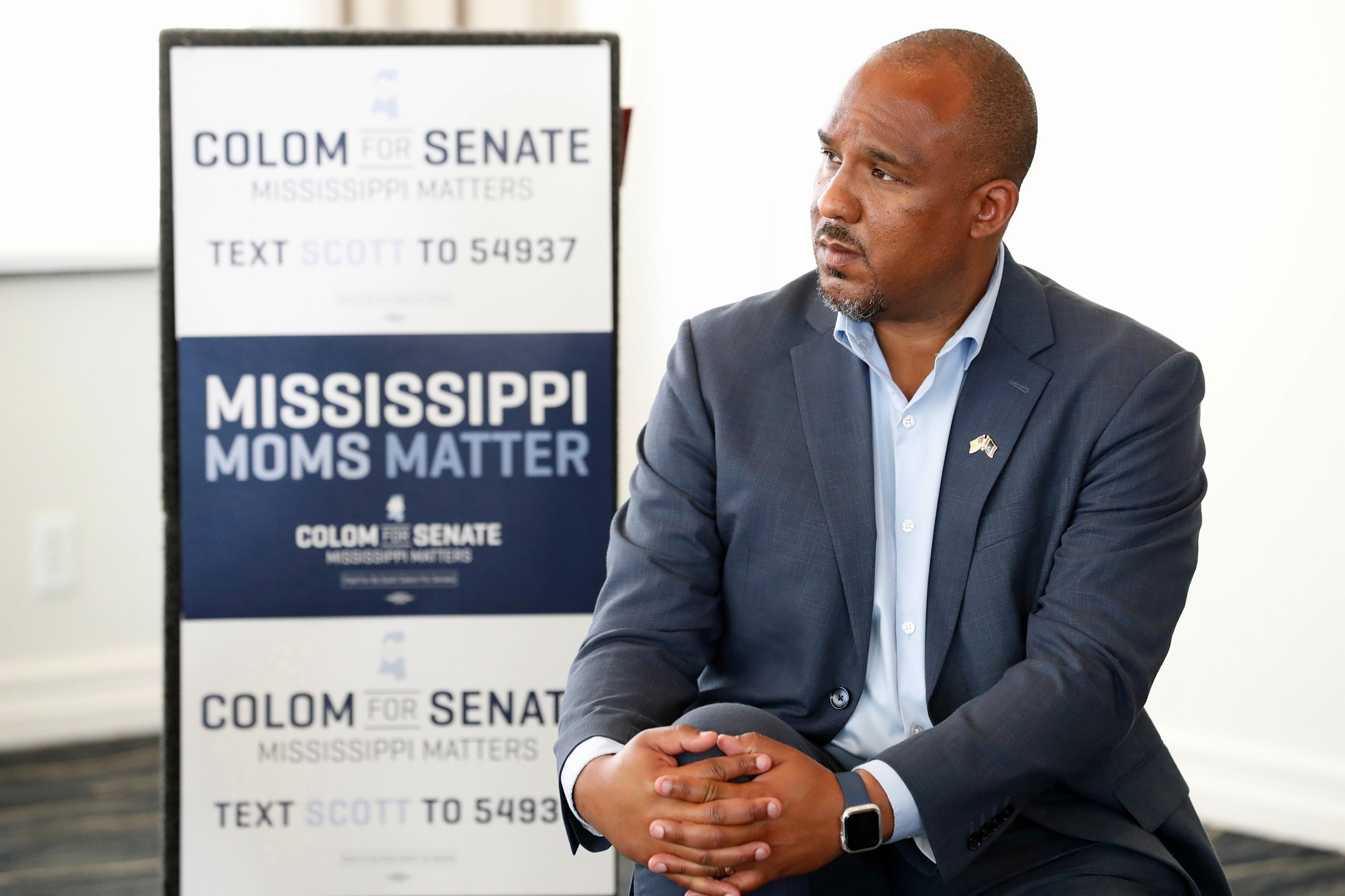 Mississippi Democratic U.S. Senate candidate Scott Colom listens during a maternal health roundtable at the Capital Club in Jackson, Miss., Aug. 1, 2026.Sarah Warnock/AP Photo