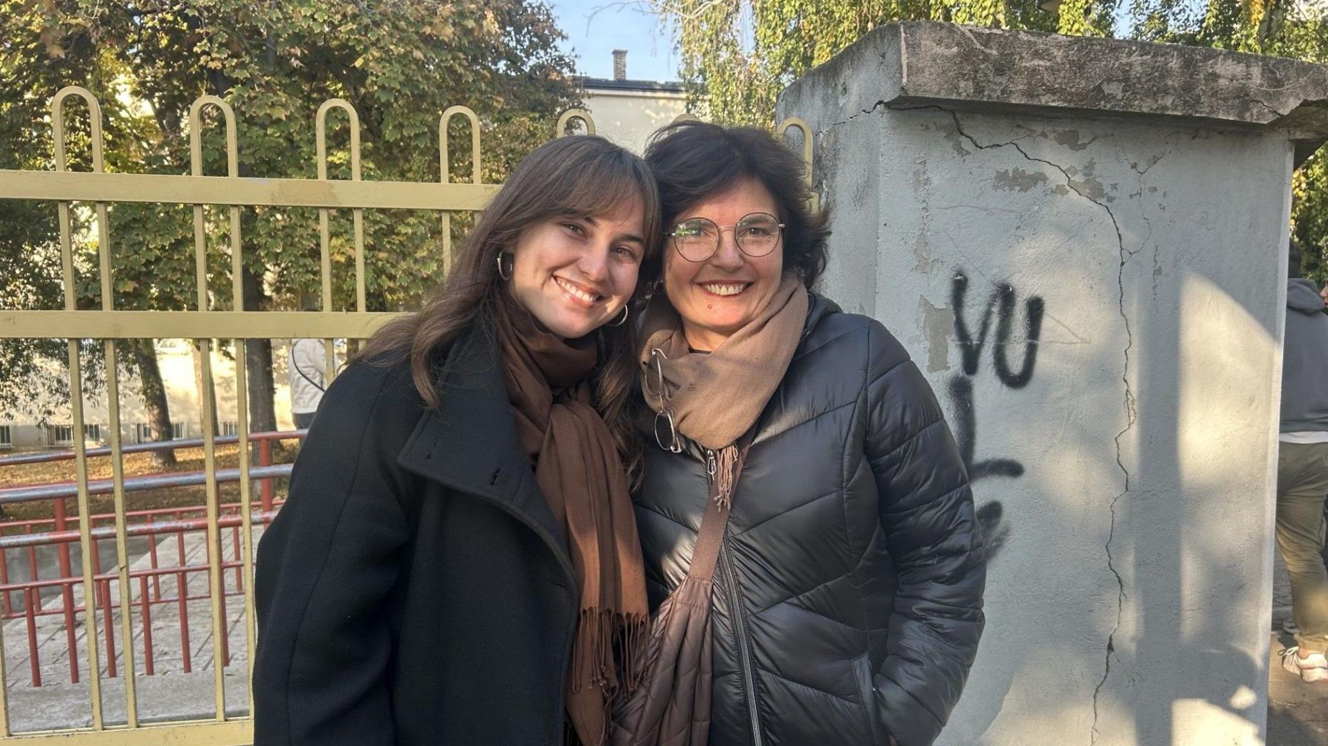 Image caption,Katarina came home to vote in Belgrade with her mother Sandra