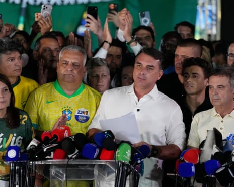 Flávio Bolsonaro speaking in Brasília after the presidential runoff results.Photograph: Eraldo Peres/AP