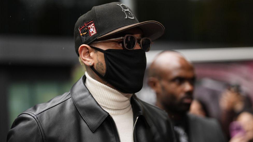 Image caption,Chris Brown (left) and Omololu Akinlolu were sentenced at Southwark Crown Court on Monday
