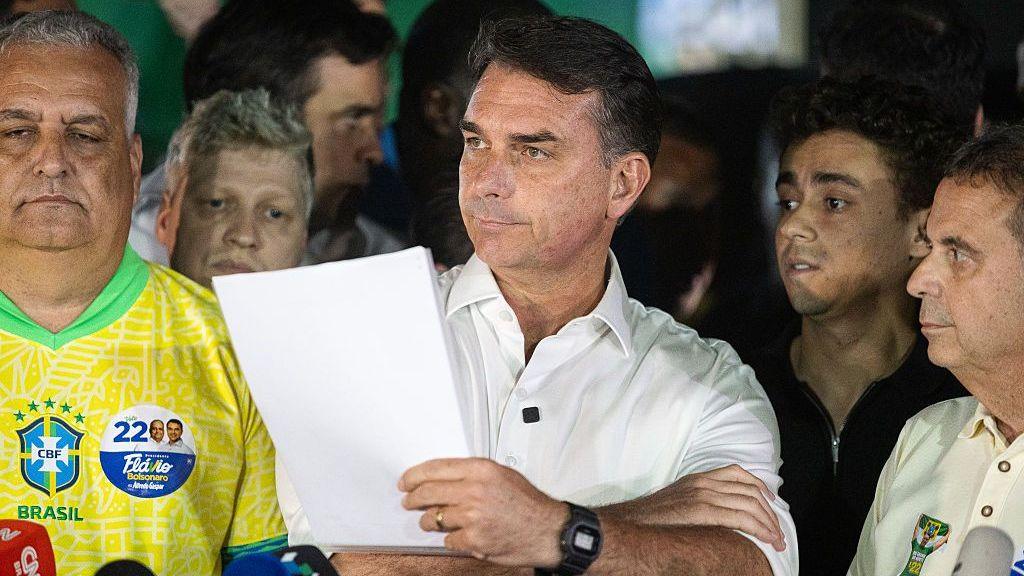 Image caption,Flávio Bolsonaro has refused to accept the result, in a press conference calling for it to be annulled