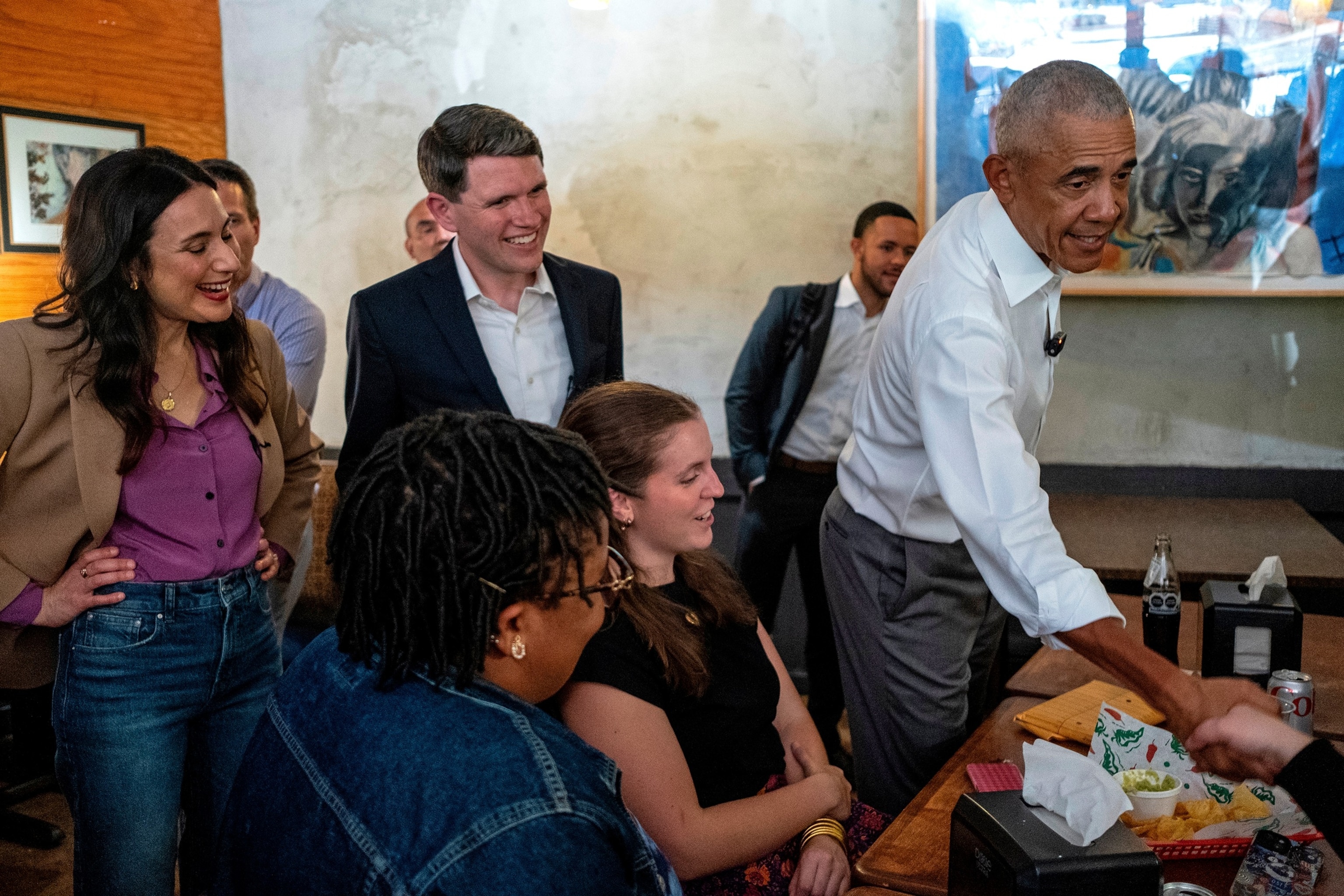 Former President Barack Obama, Texas Senate candidate James Talarico and Texas gubernatorial candidate Gina Hinojosa meet patrons at the restaurant Taco Joint on the campaign trail, May 12, 2026 in Austin, Texas.Joel Angel Juarez/Pool via Getty Images