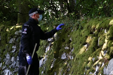 Police search land near Ann Widdecombe’s home.Photograph: Jack Taylor/Reuters