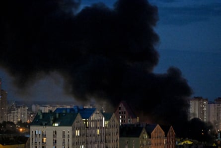 Black smoke rises above apartment blocks in Kyiv after a Russian ballistic missile strike on Saturday. At least 11 people were injured.Photograph: Ukrinform/Shutterstock