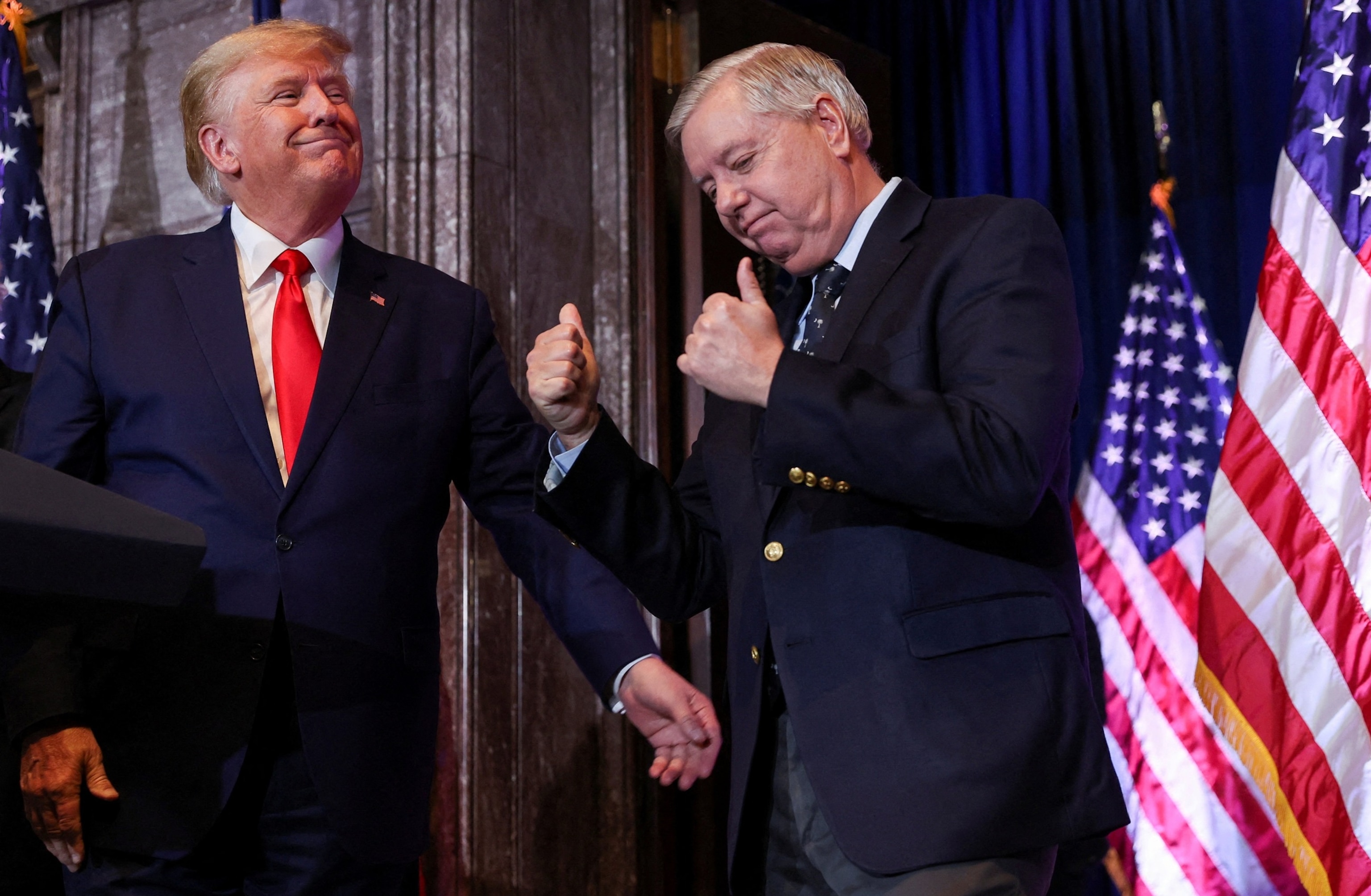 Sen. Lindsey Graham stands next to former President Donald Trump, during Donald Trump's campaign stop to unveil his leadership team, at the South Carolina State House in Columbia, South Carolina, January 28, 2023.Shannon Stapleton/Reuters