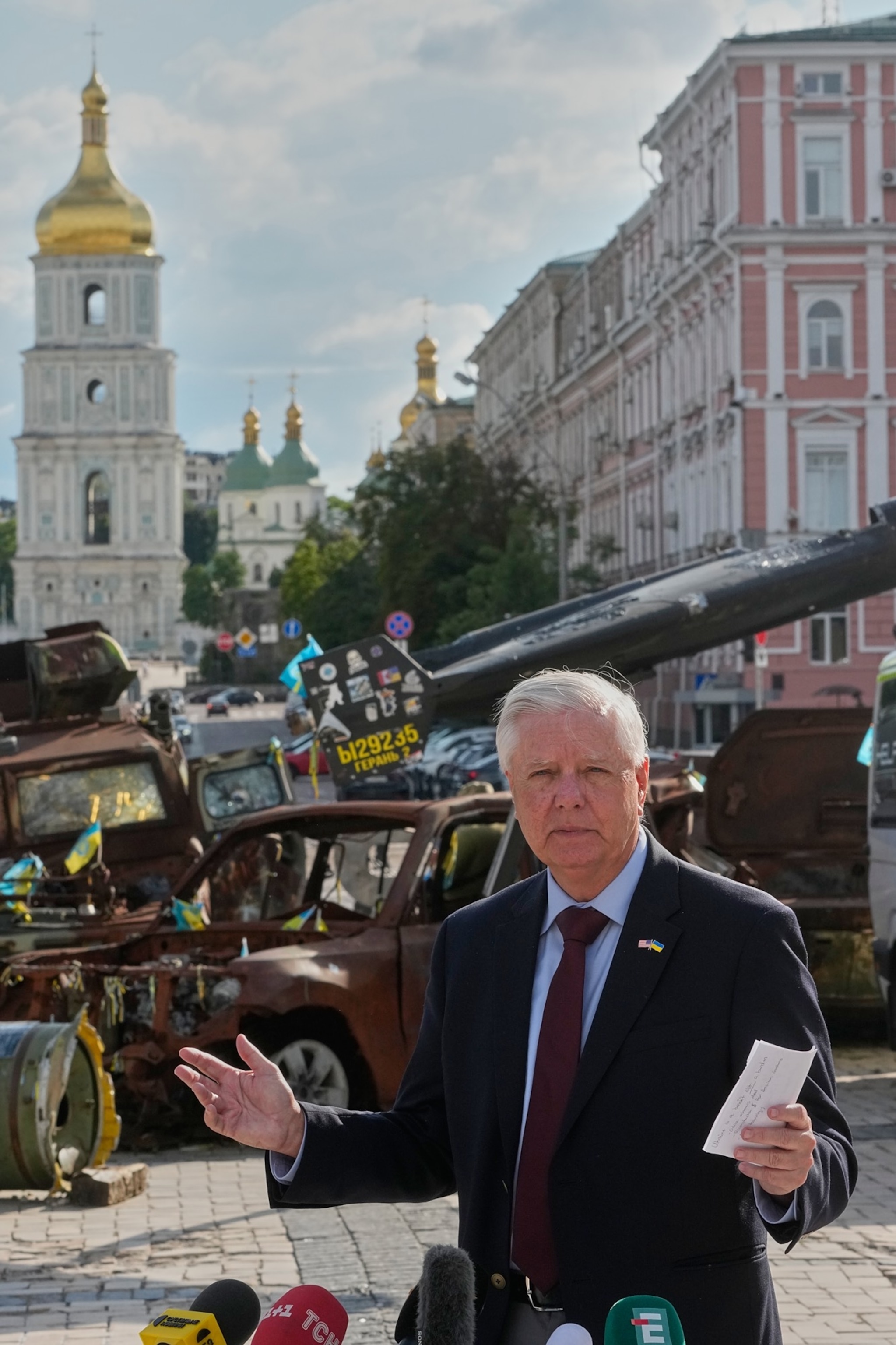 Sen. Lindsey Graham answer media questions near damaged Russian vehicles exhibition in central Kyiv, July 10, 2026.Efrem Lukatsky/AP Photo