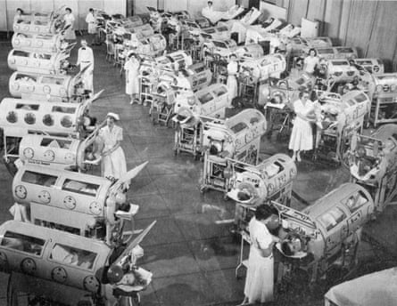 During the 1950s, as polio swept across the US, iron lungs that enabled children to breathe became a powerful symbol of a greatly feared disease.Photograph: Science History Images/Alamy