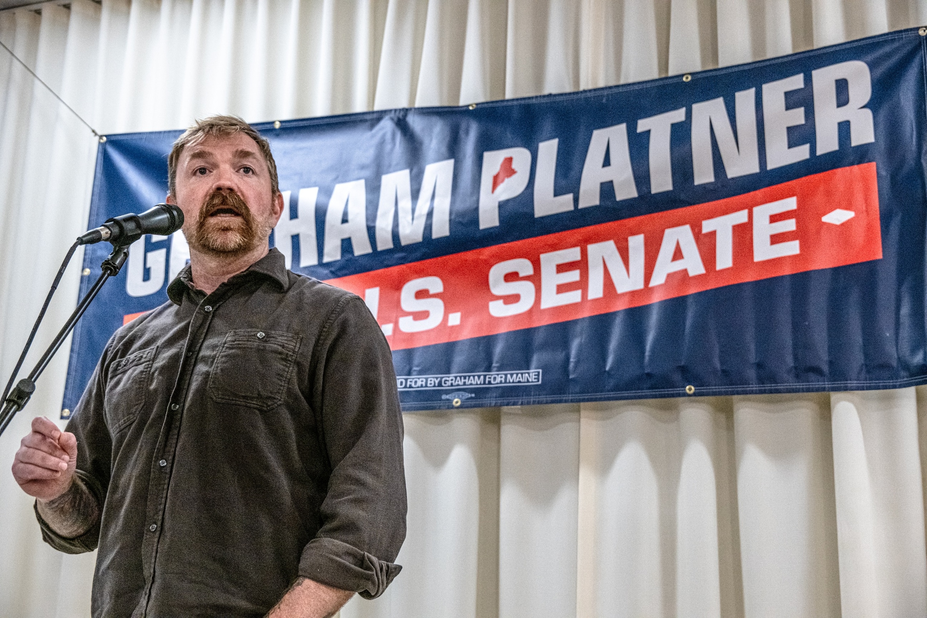 Democratic Senate candidate Graham Platner speaks to voters at a town hall at the Elks Lodge 188, June 7, 2026, in Portland, Maine.Laura Brett/Getty Images