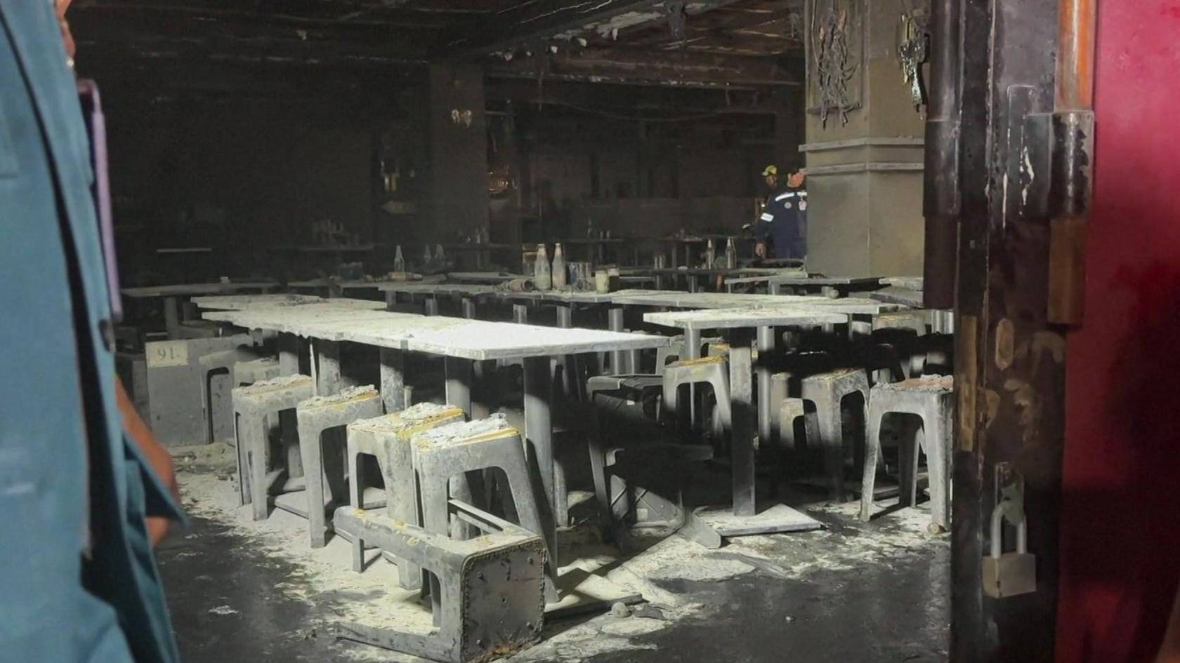 Image caption,People were seen scrambling outside as a massive blaze ripped through the bar