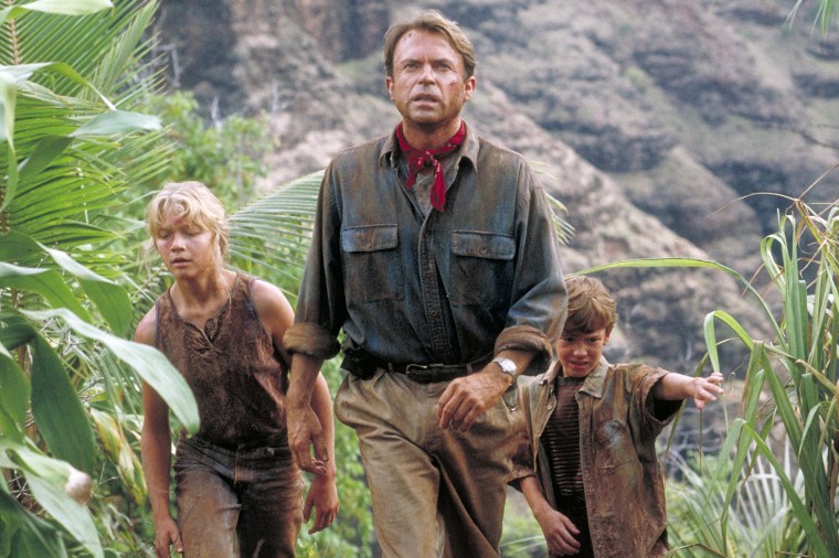 Actor Sam Neill as Dr. Alan Grant, with Ariana Richards (left) and Joseph Mazzello (right) as Lex and Tim, in “Jurassic Park”Murray Close / Getty Images file