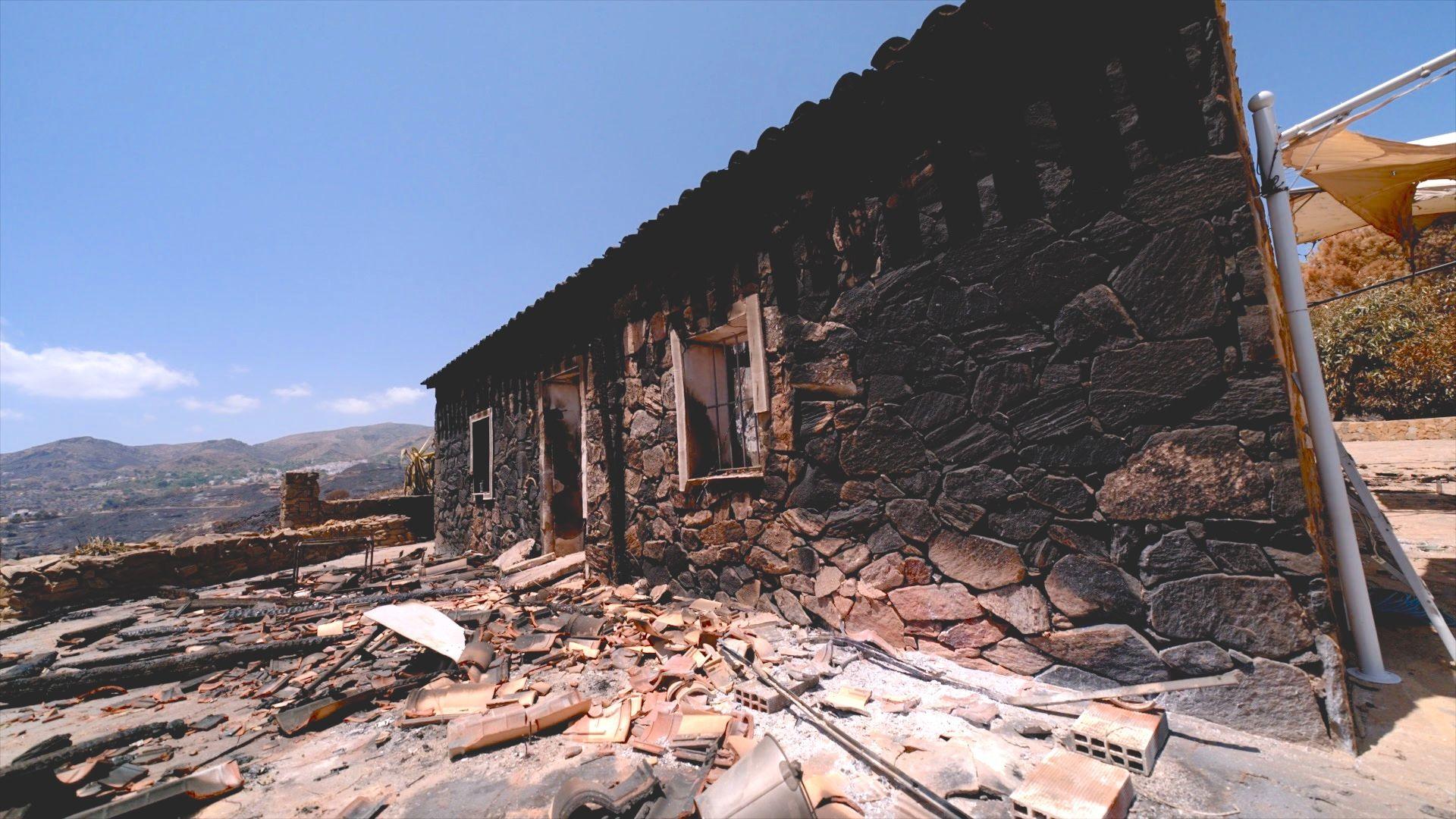 Image caption,The devastating wildfire left behind a charred landscape
