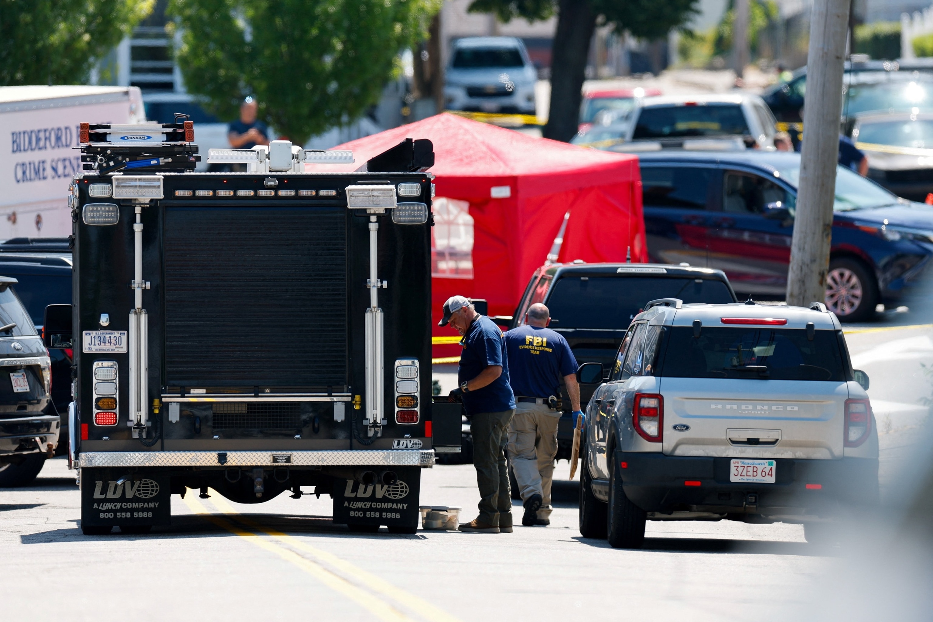 FBI agents work at a scene of a shooting involving U.S. Immigration and Customs Enforcement in Biddeford, Maine, July 13, 2026.Cj Gunther/Reuters