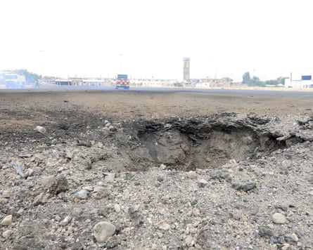 Damage to the runway of Sana’a airport on Monday.Photograph: Houthi-run Al-Masirah TV handout/EPA