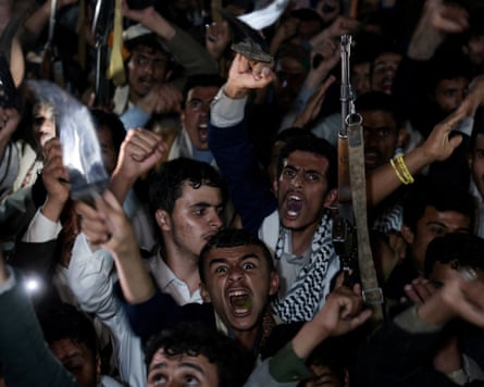 Houthi supporters demonstrate against airstrikes on Sana’a airport on Monday.Photograph: Khaled Abdullah/Reuters