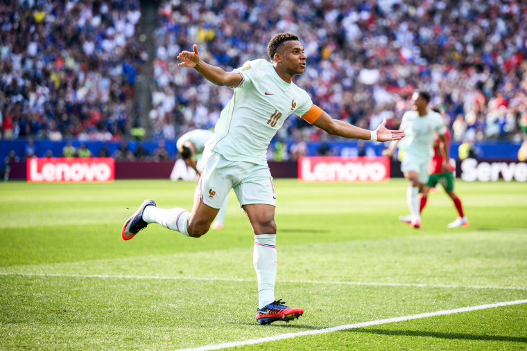 Kylian Mbappe of France celebrates after scoring his team's first goal during the FIFA World Cup 2026 Quarter Final match between against Morocco on July 9.Marvin Ibo Guengoer / GES Sportfoto via Getty Images