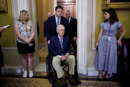 Senator Mitch McConnell is taken into a weekly policy lunch on Capitol Hill in May.Photograph: Tom Brenner/Reuters