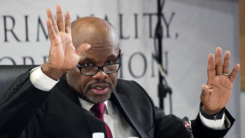 Image caption,Shadrack Sibiya, who has been suspended as deputy police chief, has denied having a close relationship with Matlala