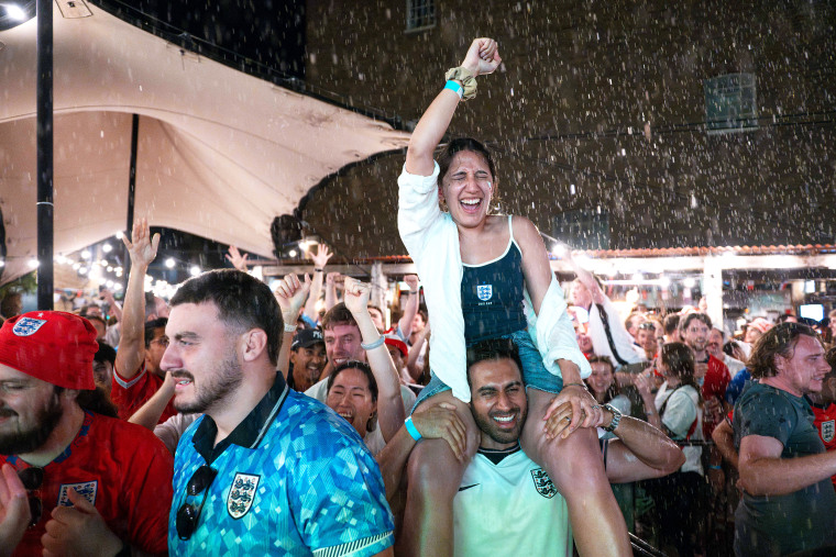 England fans in London celebrate the team's quarterfinal win over Norway on Saturday.Thomas Krych / AP