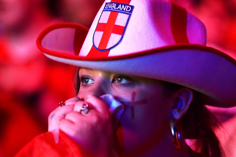 An England fan in Liverpool on Saturday.Peter Powell / AFP via Getty Images