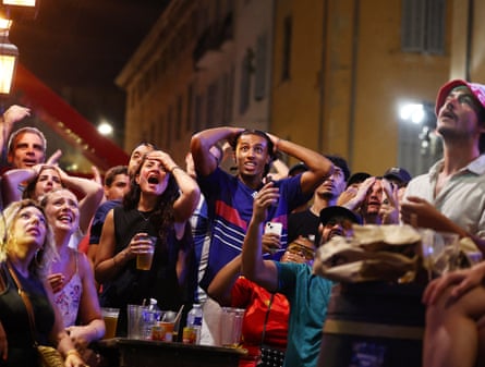 Fans in Marseille frustratedly watch on as France fail to reach the World Cup final.Photograph: Manon Cruz/Reuters