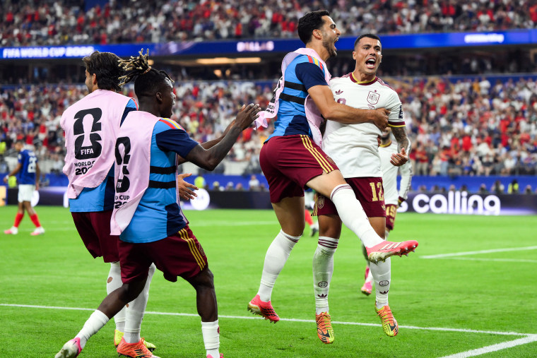 Pedro Porro of Spain celebrates with teammates after scoring the team's second goal during the FIFA World Cup 2026 Semi Final match against France on July 14.David Ramos / Getty Images