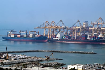 Ships docked yesterday along a pier at the Khor Fakkan container terminal, one of the major container ports in the emirate of Sharjah, along the Gulf of Oman, as Tehran announced it was closing the strait of Hormuz.Photograph: AFP/Getty Images