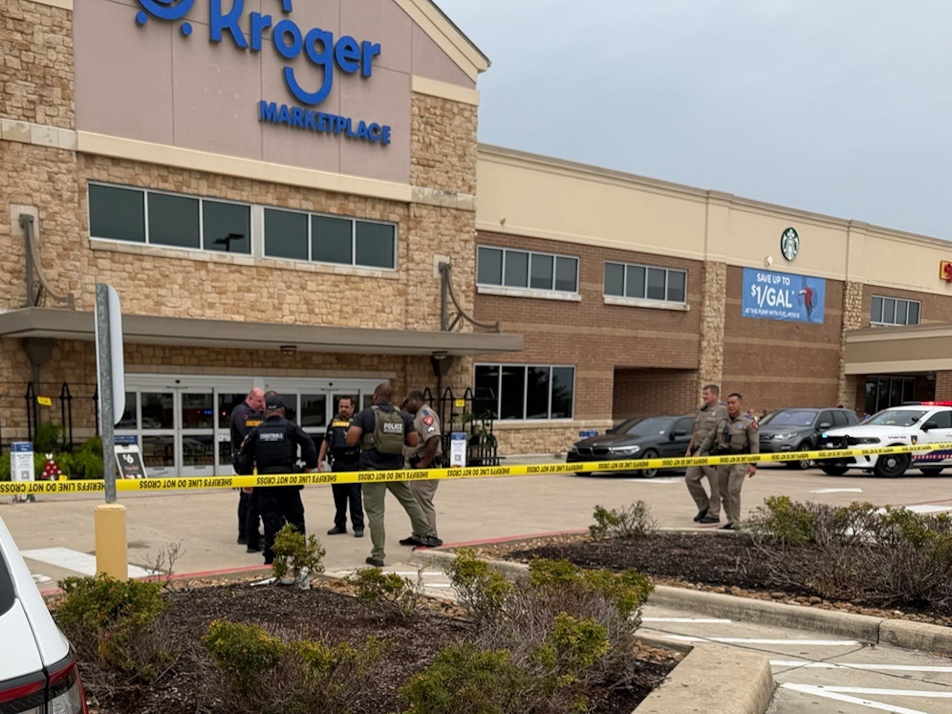 Law enforcement on the scene of a shooting at a Kroger store in Cypress, Texas, July 15, 2026.Harris County Constable Precinct 4