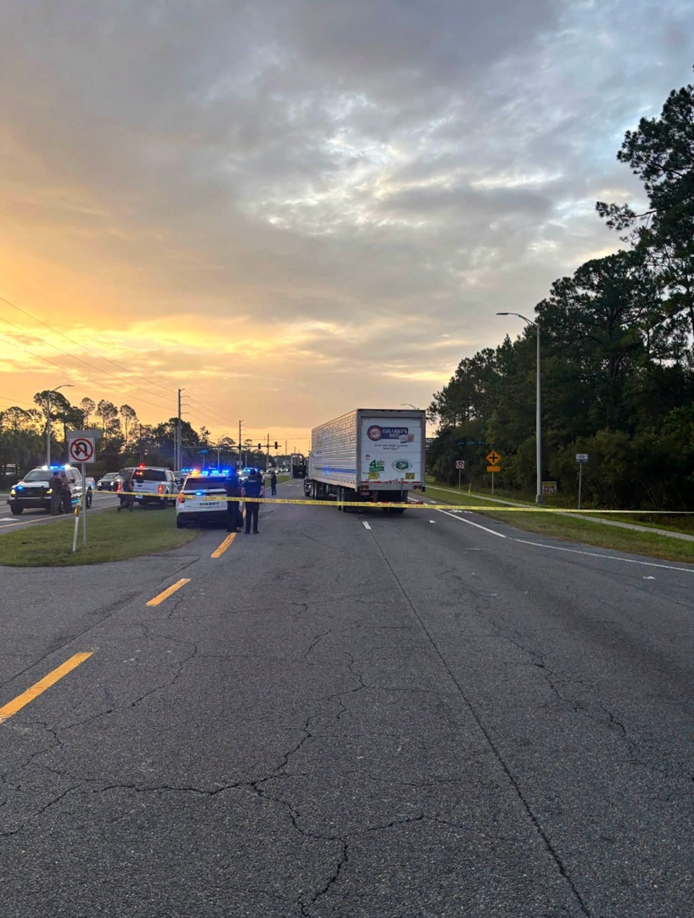 This photo released by the St. Johns County Sheriff's Office shows law enforcement at the scene where, according to a Florida Highway Patrol spokesperson, a man died after he ran from Immigration and Customs Enforcement (ICE) officers in St. Augustine, Fla., on July 14, 2026.St. Johns County Sheriff's Office