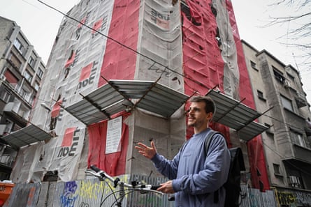 Matei Sumbasacu, the founder of Re:Rise, in front of a building that is being reinforced against earthquakes.Photograph: Daniel Mihăilescu/AFP/Getty Images