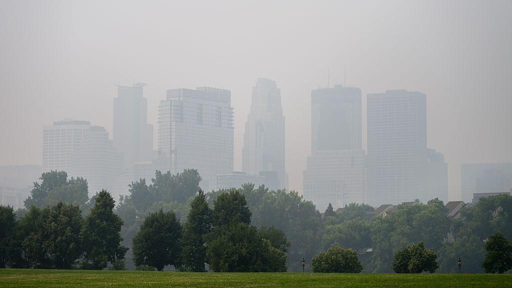 Image caption,Minneapolis is also under a smoky haze