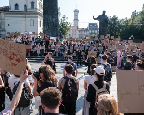 Activists with banners protest against the resignation of Ukrainian defence minister Mykhailo Fedorov during a rally near the monument to Ukrainian poet Taras Shevchenko in Lviv, Ukraine.Photograph: Global Images Ukraine/Getty Images