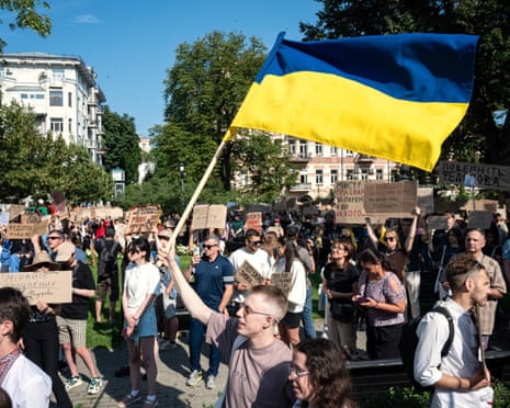 A demonstrator waves a Ukrainian flag during a rally against the dismissal of Ukrainian defence minister Mykhailo Fedorov in Kyiv, Ukraine.Photograph: Ukrinform/Shutterstock