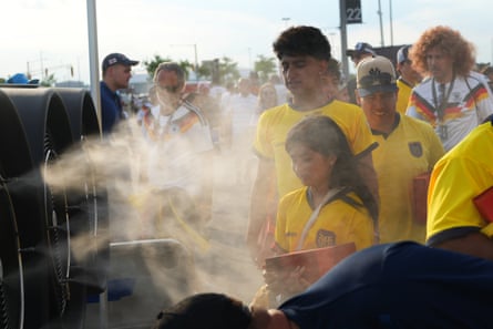 Fans enjoy cooling mist spray during the Fifa World Cup 2026 Group E match between Ecuador and Germany at New York New Jersey Stadium on 25 June 2026.Photograph: China News Service/Getty Images