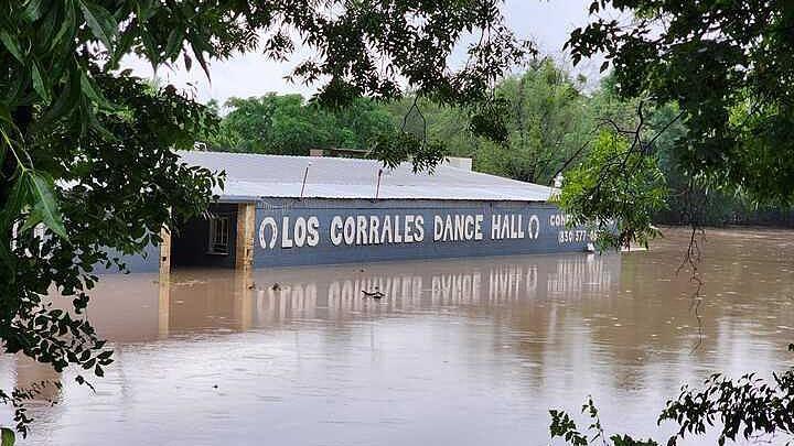 Image caption,Floodwaters engulfed the Rodeo Los Corrales Dance Hall in Comfort, Texas