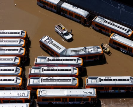 A flooded bus depot in West Hollywood.Photograph: Daniel Cole/Reuters